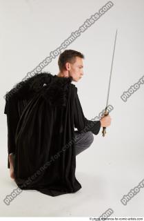 CLAUDIO KNEELING POSE WITH SWORD (8)